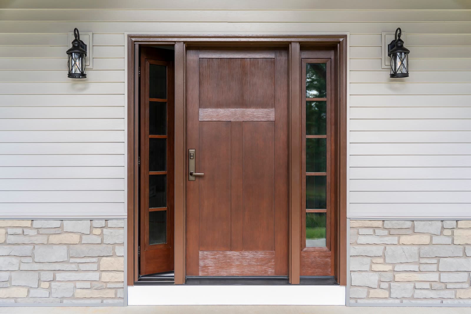 ProVia Signet Fir double entry door with venting sidelites, truffle finish, and bronze Trilennium hardware