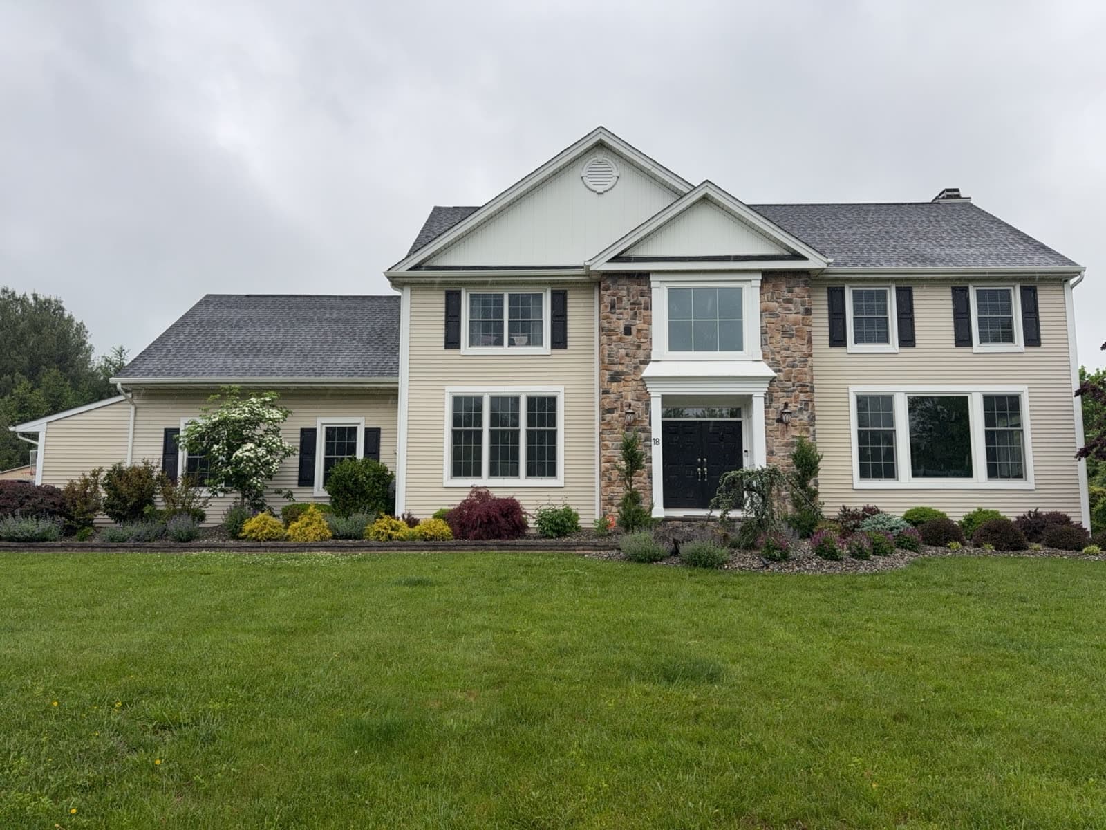 New Jersey home with dated tan siding before Revive renovation
